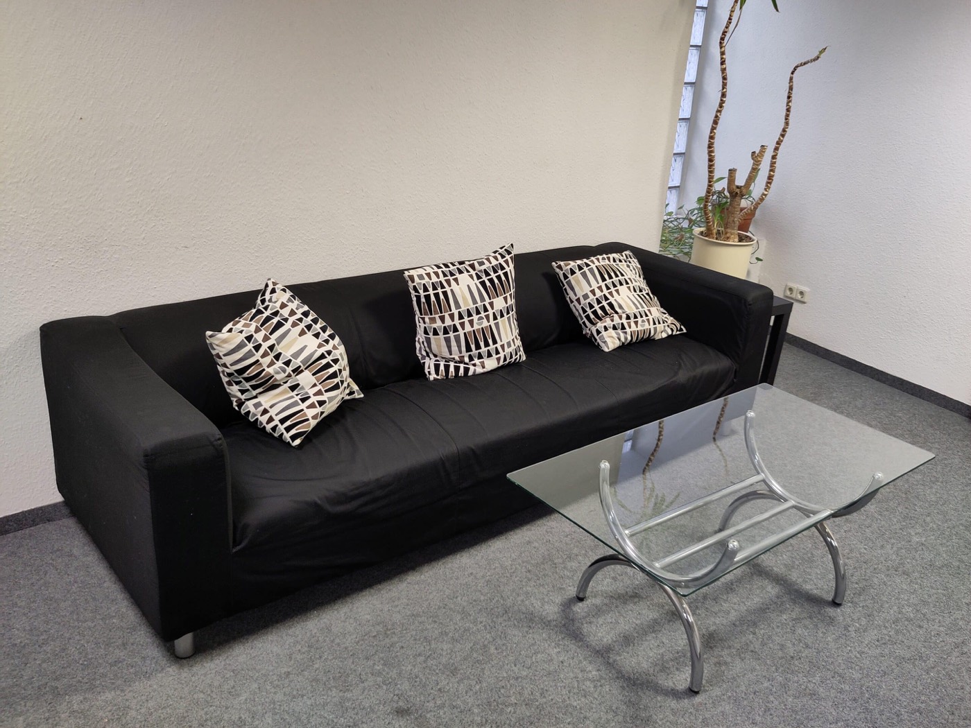 Sitzecke mit Sofa im Beratungsraum der MPU Akademie Westfalen